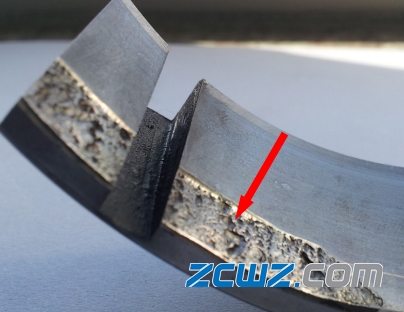 圆锥滚子轴承滚道破损和贯穿裂纹故障分析